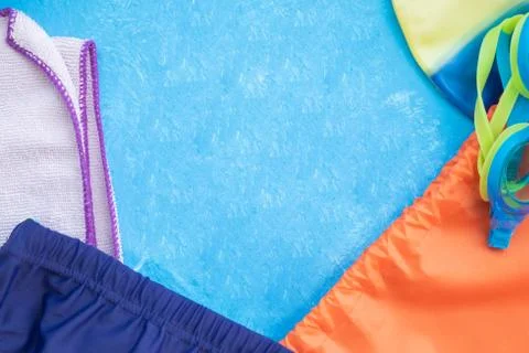 Layout on a bright blue background. Concept adult and children swimming in th Stock Photos