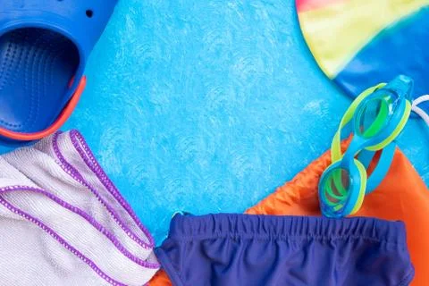 Layout on a bright blue background. Concept adult and children swimming in th Stock Photos