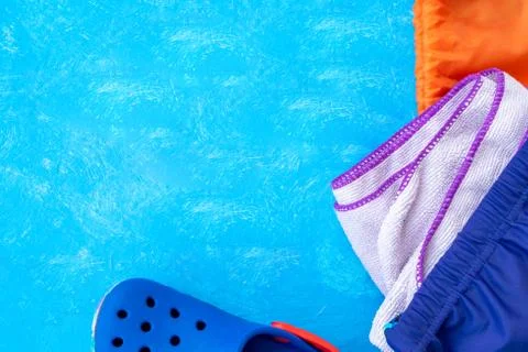 Layout on a bright blue background. Concept adult and children swimming in th Stock Photos