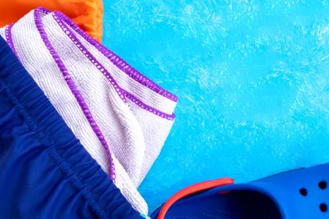 Layout on a bright blue background. Concept adult and children swimming in th Stock Photos