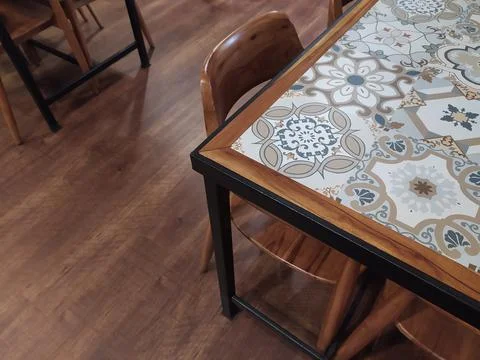 The layout of the dining table and chairs made of wood Stock Photos