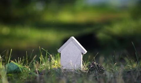 Layout of the house on the grass Stock Photos