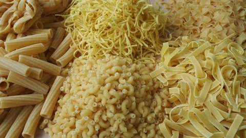 Layout of Italian raw pasta, different types and shapes of pasta Stock Footage 212632759