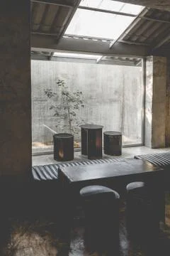 Layout in a loft style in dark colors open space interior view of various cof Stock Photos