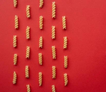 Layout made of pasta - flat lay on red background 스톡 사진