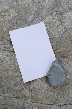 Layout of poster on stone. White blank with space for text or design Stock Photos