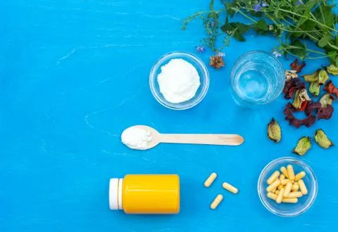 Layout with powder for preparing a medicinal mixture, tablets and a jar for Stock Photos