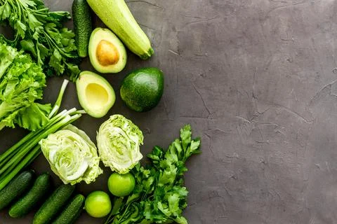 Layout of raw green vegetables, top view Stock Photos
