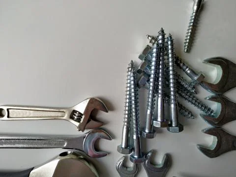 Layout of tools for plumbing repairs on a white background Stock Photos