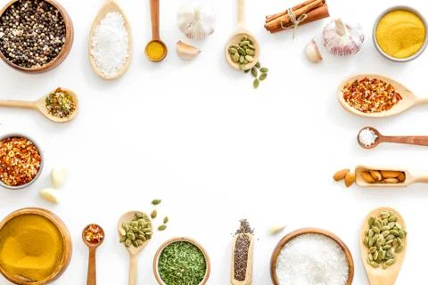 Layout of various spices in spoons. Top view, copy space Stock Photos