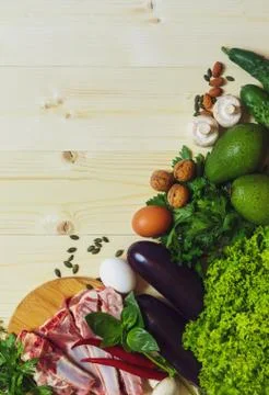 Layout of vegetables, meat, eggs and other products for a balanced diet Stock Photos