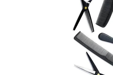 Layout on white from scissors and combs for hairdressing services Stock Photos