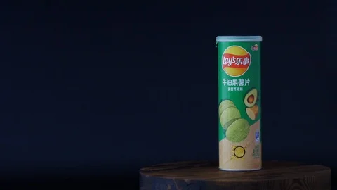 Lay's Chips in china : Avocado Chips Product on  rotating wooden plate Stock Footage 117300212