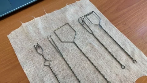 Lays speech therapy instruments on a white napkin Video stock 159729336
