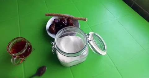 Lays sugar in the tea. Stock Footage 76688561