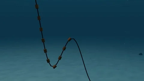 Lazy wave dynamic cable with buoyancy modules close up loop Vídeos de archivo 344651796