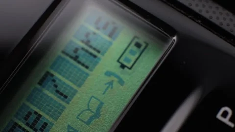 LCD Display of a Cordless Extension Phone Handset Stock Footage 337818089
