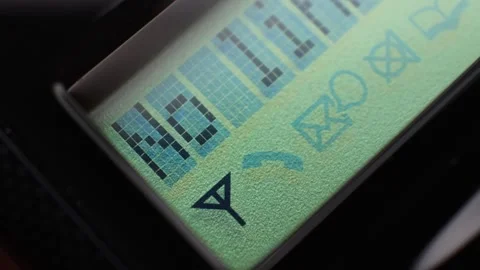 LCD Display of a Cordless Extension Phone Handset Stock Footage 337818136