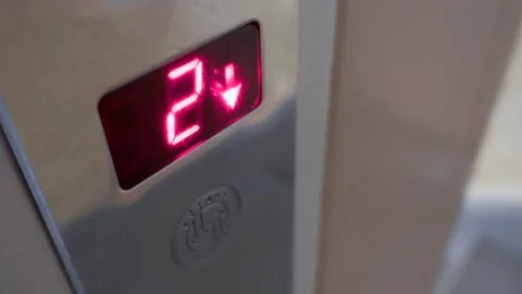 LCD display in elevator showing change of floors when going down Stock Footage 312150371