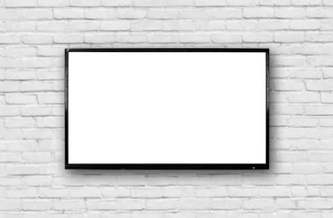 LCD TV with a thin black frame hanging on a white brick wall. Blank white scr Stock Photos