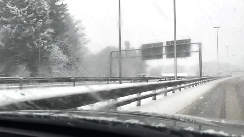 LD Driving on a highway in snow Stock Footage 146087113
