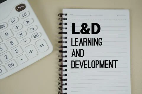 L&amp;D Learning and Development text with calculator phrase of business and fi.. 스톡 사진