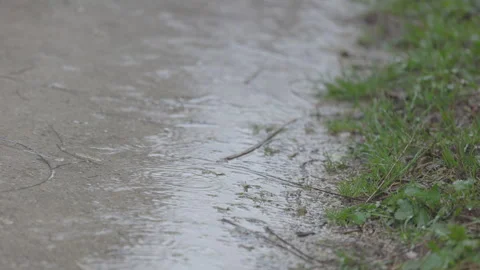 LD Puddle on an asphalt road in rain Stock Footage 270282590