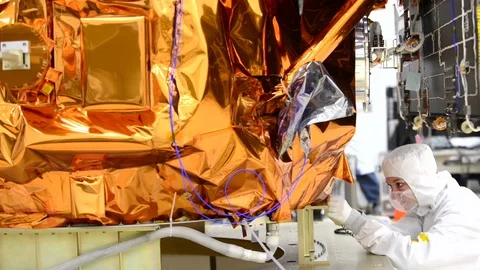 LDCM spacecraft being assembled in the cleanroom at Orbital Sciences Corp - 2013 Stock Footage 112273378