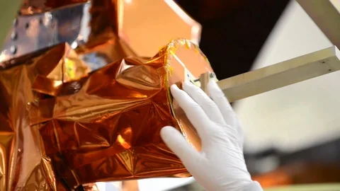 LDCM spacecraft being assembled in the cleanroom at Orbital Sciences Corp - 2013 Stock Footage 112273394