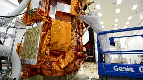 LDCM spacecraft being assembled in the cleanroom at Orbital Sciences Corp - 2013 Stock Footage 112273409
