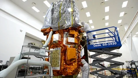LDCM spacecraft being assembled in the cleanroom at Orbital Sciences Corp - 2013 Stock Footage 112273426