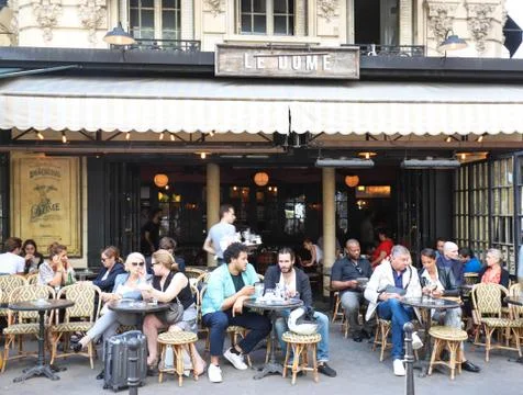 Le Champ de Mars is traditonal French cafe located near the Eiffel tower in P Stock Photos