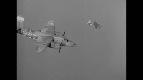 LE LUDE - 1944 - B-26 planes drop bombs that explode over Le Lude, France. Stock Footage 296692534