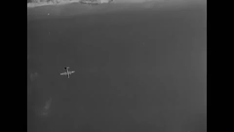 LE LUDE - 1944 - B-26 planes drop bombs that explode over Le Lude, France. Stock Footage 296695030