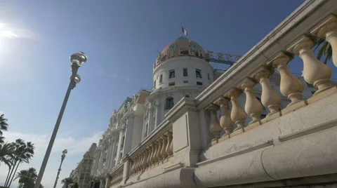 Le Negresco Hotel seen on Promenade des Anglais on a sunny day in Nice Stock Footage