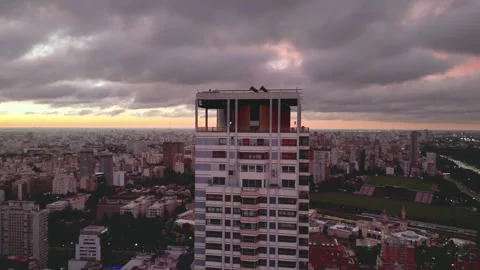 Le Parc Tower stands tall during a dramatic sunset over Buenos Aires with Video stock 293600308