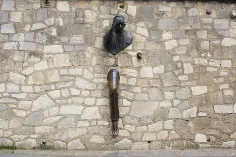 Le Passe-Muraille Statue Embedded in Stone Wall, Paris 22.10.2023 France Stock Photos