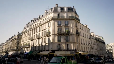 Le Petit Cardinal restaurant in Rue Monge Street with bustling traffic and Stock Footage 246304842