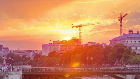 Le Pont D'Arcole bridge at sunset with boats timelapse, Paris, France, Europe Stock Footage 236997960