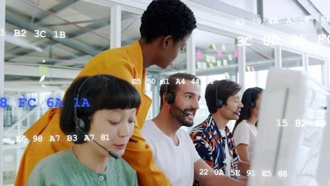 Lead approaching leaning over call reps, scanning screens and coaching, code Stock Footage 333670931