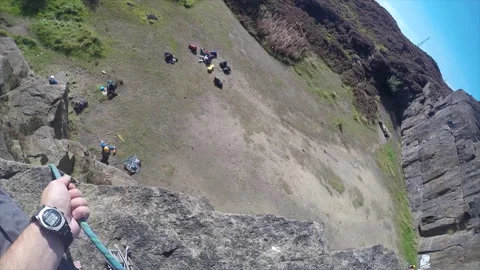 Lead Belaying at top of climb Stock Footage 160264426