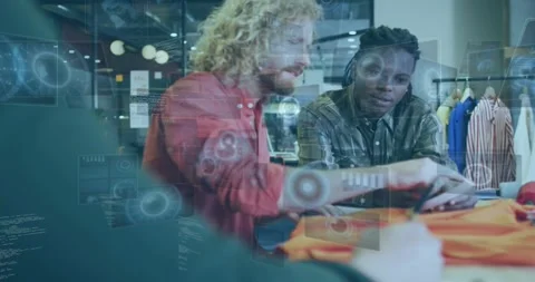 Lead designer handling orange sample, tapping tablet, sparking HUD guiding Vidéo 332281661