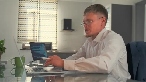 Lead developer explains strategies during online discussion, driving efficiency. Stock Footage 294174353