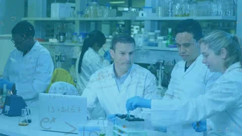 Lead directing, junior pipetting samples into rack, animated data on laptop Stock Footage 330540462