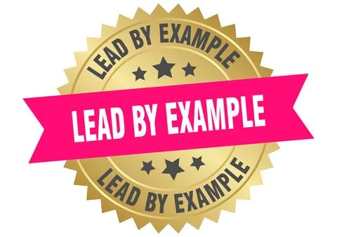 Lead by example. lead by example round pink and gold label isolated on tran.. Stock Illustration