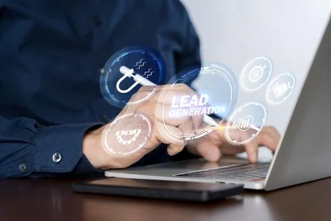 Lead Generation concept. Businessman using laptop with lead generation icon.. Stock Photos
