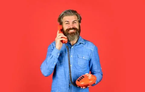 Lead generation specialist. Sales script. Bearded man phone conversation. Retro Stock Photos