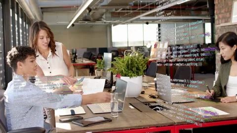 Lead handing docs starting business sync while team on laptops noting code Stock Footage 333594503