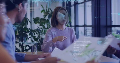 Lead in lavender sweater passing charts, sparking radar overlays on data, Vídeo Stock 334185361
