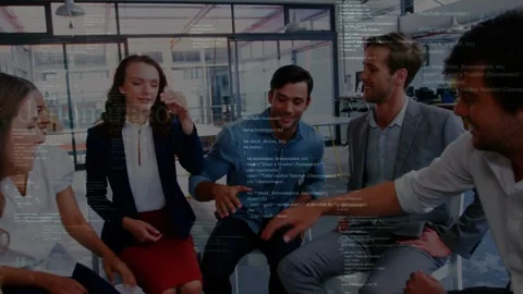 Lead man leaning gesturing initiating team stacking hands for teamwork with code Stock Footage 333574983